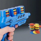 Jouet lanceur interactif pour chat en plastique durable, rouge avec disques colorés, sans piles, stimule l’activité physique et mentale.